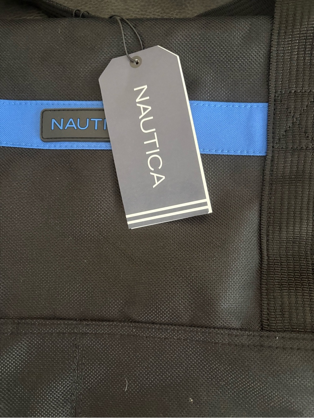 Nautica Black duffel bag with Royal Blue Stripe.NWT